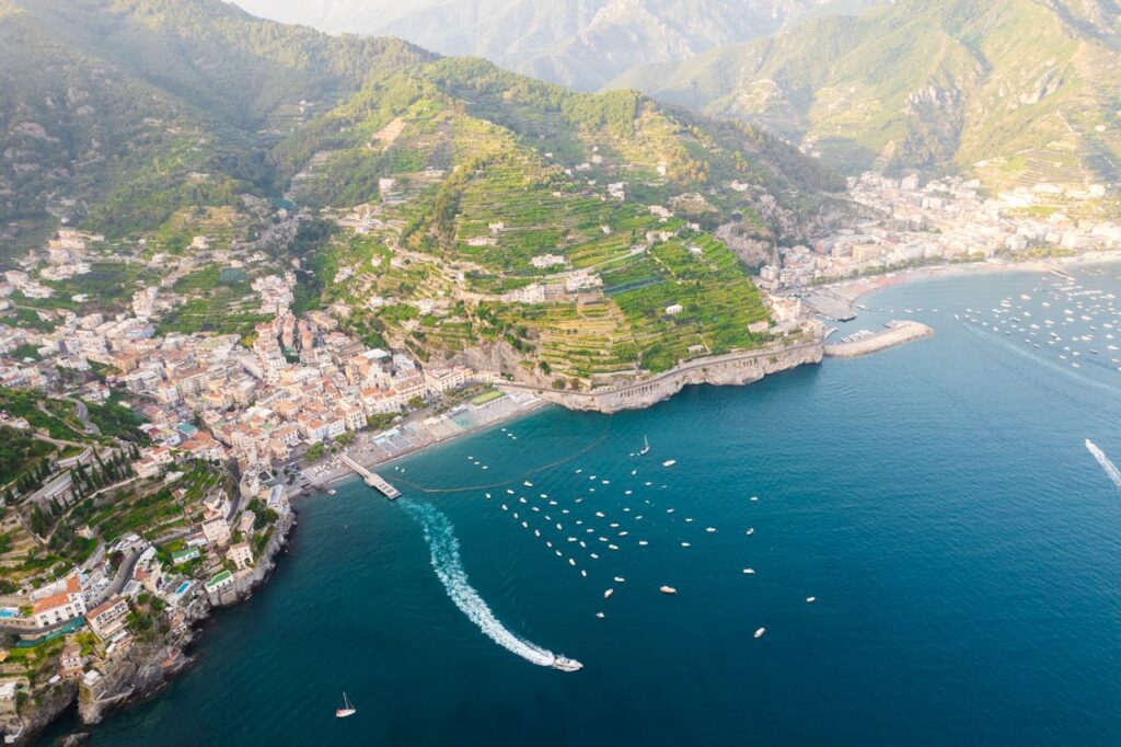 pexels-photo-17807444 Stunning aerial view of Amalfi coastline, showcasing the vibrant landscape and serene sea.